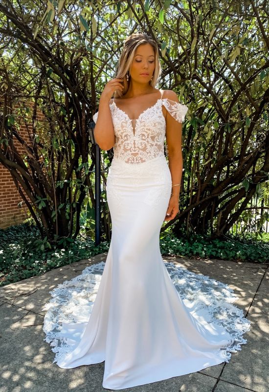 Crepe lace dress with spaghetti straps and removable off the shoulder straps and long train at Love it at Stella's Bridal in Westminster, MD
