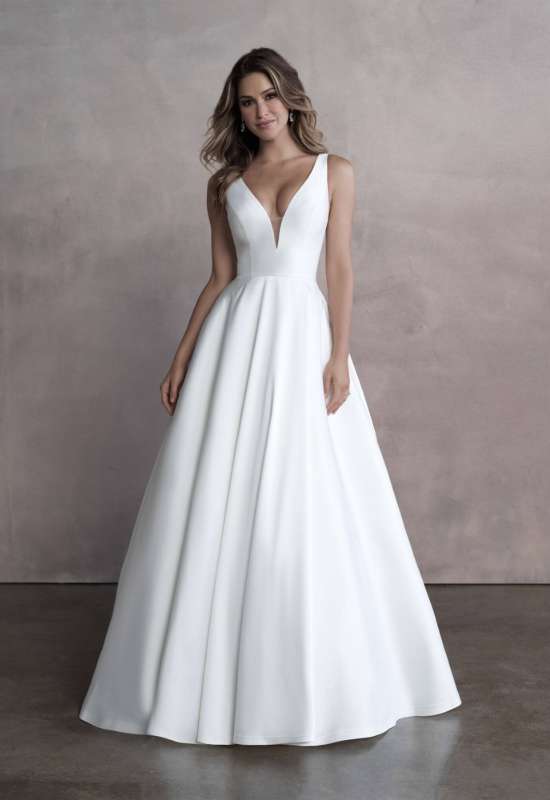 Avon by allure bridals simple satin a-line ballgown with satin bow in back and pockets sold at Love it at stellas bridal shop in maryland