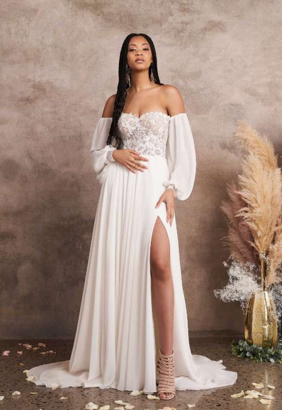Leona by Lillian West bridals off the shoulder balloon sleeve sparkly corset style top slit chiffon lace wedding dress love it at stellas bridal shop in maryland
