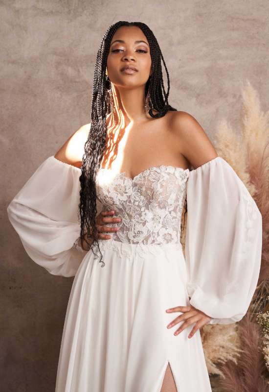 Leona by Lillian West bridals off the shoulder balloon sleeve sparkly corset style top slit chiffon lace wedding dress love it at stellas bridal shop in maryland