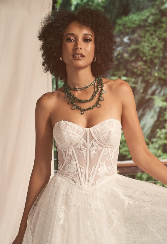 Lillian West 66277 basque waist corset top wedding dress at love it at stellas bridal shop in westminster MD