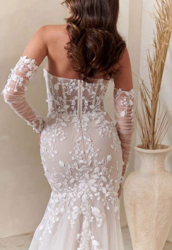 August by Serene by Madi Lane. Fitted florar corset top wedding dress with detachable long sleeves at love it at stellas bridal in westminster MD