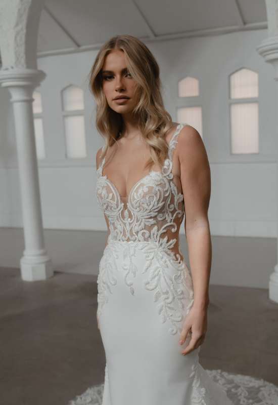 Savoy by Madi Lane Bridals. Decorative corset style wedding dress with detachable lace sleeves at love it at stellas bridal shop in Westminster MD