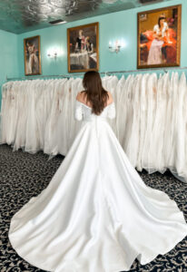 Gwendolyn - Stella's Bridal Long Sleeve off the shoulder Satin Wedding Dress at Love it at Stella's Bridal Boutique in Westminster Maryland