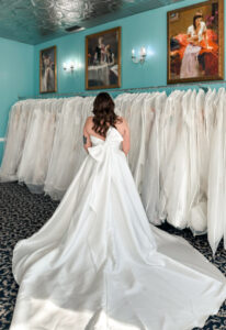 Opal - Stella's Bridal Fitted satin wedding dress with detachable overskirt at Love it at Stella's Bridal Boutique in Westminster, Maryland