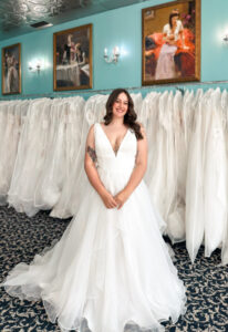 Samba - Stella's Bridal Minimal v-neck ruffle skirt summer wedding dress at Love it at Stella's Bridal Boutique in Westminster, Maryland