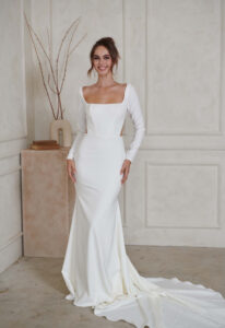 Madi Lane Serene North Crepe Fitted Wedding Dress with a Low Back at Love it at Stella's Bridal Shop in Westminster, Maryland
