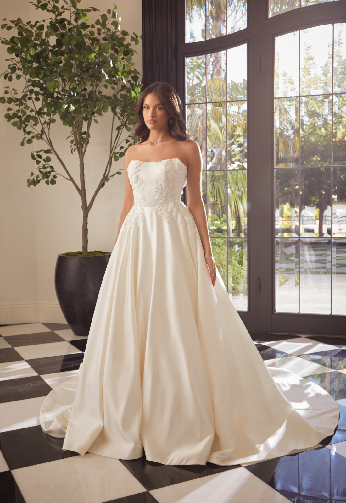Addison - Stella's Bridal An a-line wedding dress in satin, featuring floral chiffon appliques and detachable off-the-shoulder drapes. Shown in Ivory and designed by Casablanca Bridal. A modern bridal gown available at Stella’s Bridal in Westminster, Maryland. Casablanca Bridal Style 2561 Addison.