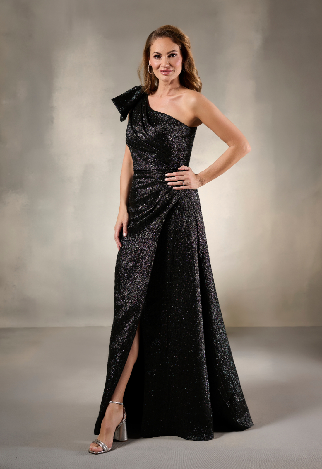 Mother of the bride and mother of the groom dresses at Stella’s Bridal in Westminster MD, featuring elegant evening gowns, formal dresses, and special occasion styles in inclusive sizing.
