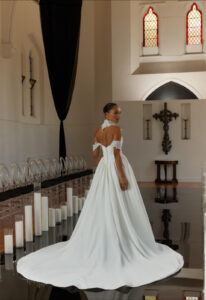 Chappell - Stella's Bridal Evie Young Chappell wedding dress featuring an a-line silhouette with sweetheart neckline, satin skirt, and sparkling lace details. Available at Stella’s Bridal in Westminster, Maryland.