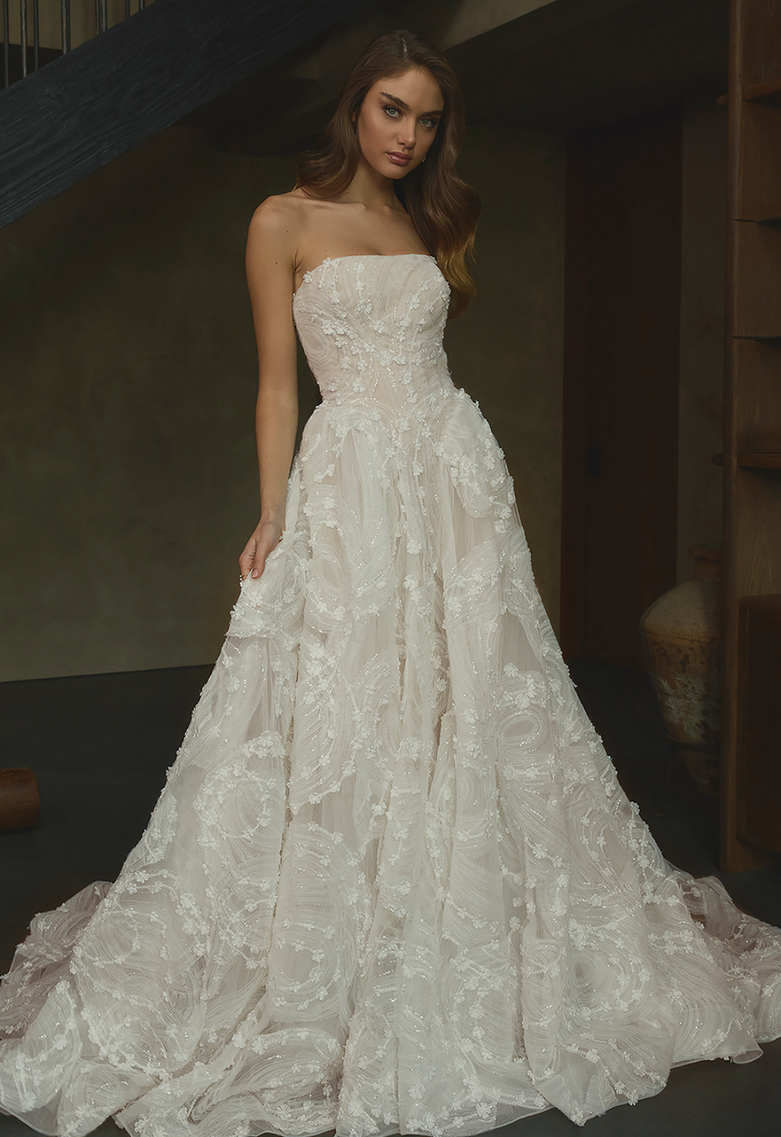 Coralie - Stella's Bridal Casablanca Coralie wedding dress featuring a ballgown silhouette with straight neckline, starry night lace skirt, and floral details. Available at Stella’s Bridal in Westminster, Maryland.