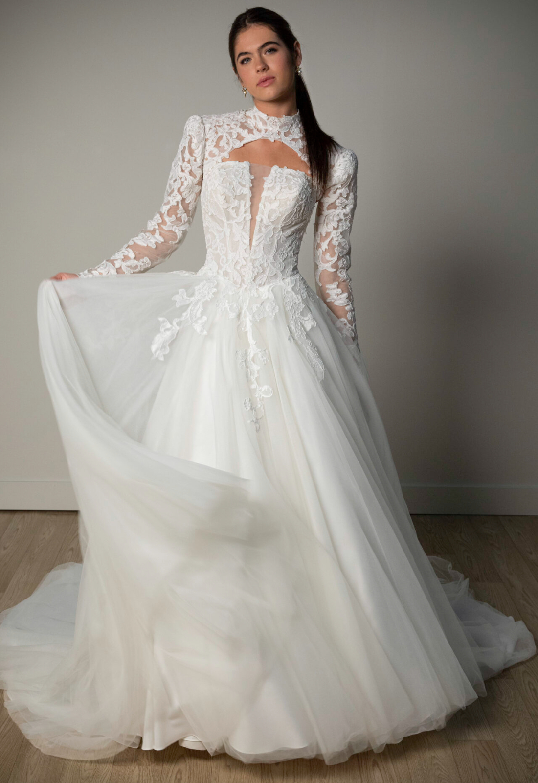 Deanne - Stella's Bridal Stella York SY8324 wedding dress featuring a ballgown silhouette with plunge neckline, tulle skirt, and lace details. Available at Stella’s Bridal in Westminster, Maryland.