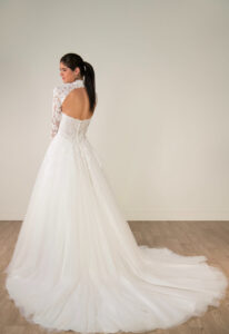 Deanne - Stella's Bridal Stella York SY8324 wedding dress featuring a ballgown silhouette with plunge neckline, tulle skirt, and lace details. Available at Stella’s Bridal in Westminster, Maryland.