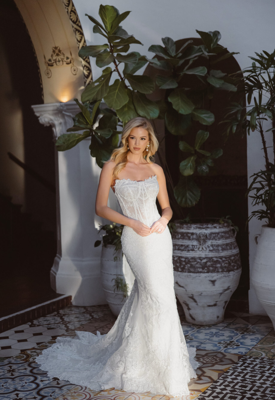 Dorian Essense of Australia D4541 wedding dress featuring a fitted silhouette with cat-eye neckline, lace skirt, and boho details. Available at Stella’s Bridal in Westminster, Maryland.