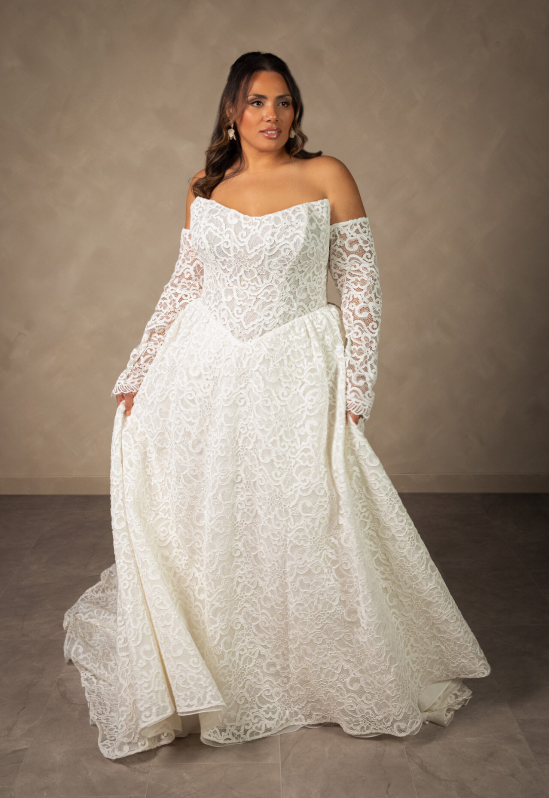 Fern - Stella's Bridal Essense of Australia D4591 wedding dress featuring a ballgown silhouette with cat-eye neckline, lace skirt, and pleated details. Available at Stella’s Bridal in Westminster, Maryland.