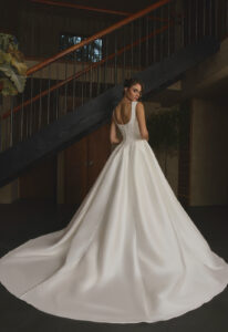 Finch - Stella's Bridal Casablanca Finch wedding dress featuring a ballgown silhouette with portrait neckline, satin skirt, and lace details. Available at Stella’s Bridal in Westminster, Maryland.