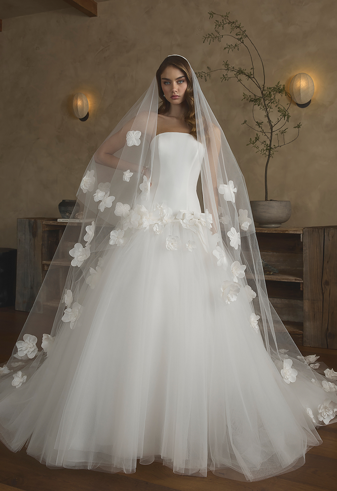 Giannina - Stella's Bridal Casablanca Giannina wedding dress featuring a dropped waist ballgown silhouette with straight neckline, tulle skirt, and floral details. Available at Stella’s Bridal in Westminster, Maryland.