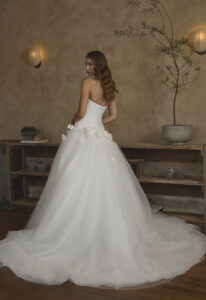 Giannina - Stella's Bridal Casablanca Giannina wedding dress featuring a dropped waist ballgown silhouette with straight neckline, tulle skirt, and floral details. Available at Stella’s Bridal in Westminster, Maryland.