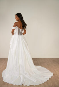 Grove - Stella's Bridal Stella York SY8309 wedding dress featuring a ballgown silhouette with sweetheart neckline, satin skirt, and pick-up details. Available at Stella’s Bridal in Westminster, Maryland.
