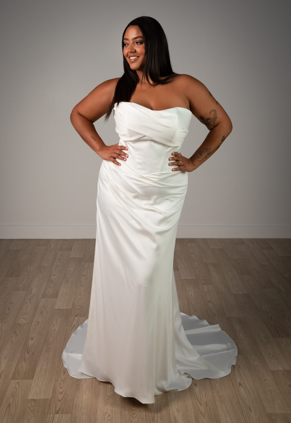 Hareton - Stella's Bridal Stella York SY8347 wedding dress featuring a fitted silhouette with sweetheart neckline, satin skirt, and ruched details. Available at Stella’s Bridal in Westminster, Maryland.