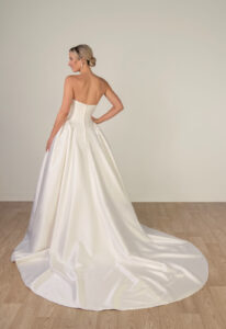 Heather - Stella's Bridal Stella York SY8274 wedding dress featuring a ballgown silhouette with straight neckline, satin skirt, and gathered details. Available at Stella’s Bridal in Westminster, Maryland.