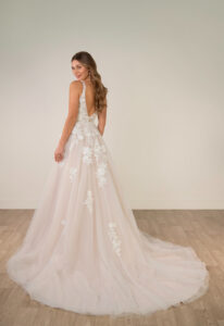 Linton - Stella's Bridal Stella York SY8316 wedding dress featuring an a-line silhouette with v-neck neckline, tulle skirt, and boho lace details. Available at Stella’s Bridal in Westminster, Maryland.