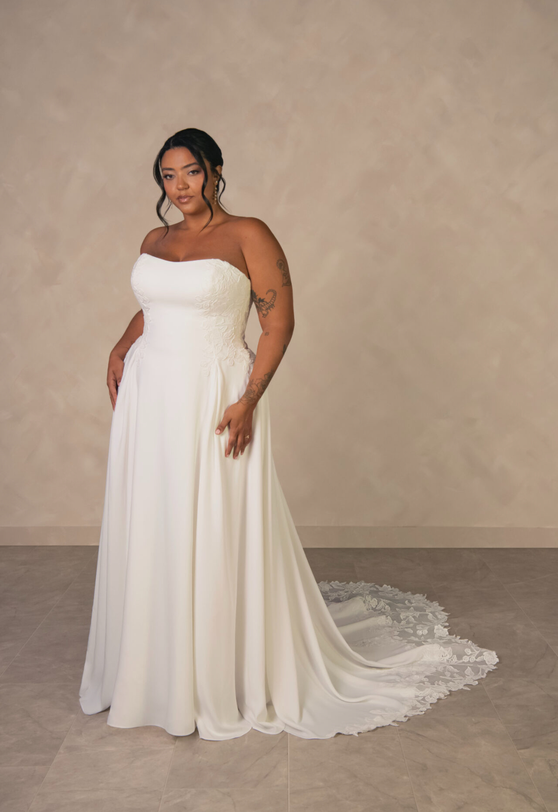 Rebecca - Stella's Bridal Essense of Australia D4504 wedding dress featuring an a-line silhouette with straight neckline, crepe skirt, and lace details. Available at Stella’s Bridal in Westminster, Maryland.