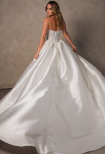 Romy - Stella's Bridal Essense of Australia D4546 wedding dress featuring a ballgown silhouette with straight neckline, satin skirt, and beaded details. Available at Stella’s Bridal in Westminster, Maryland.