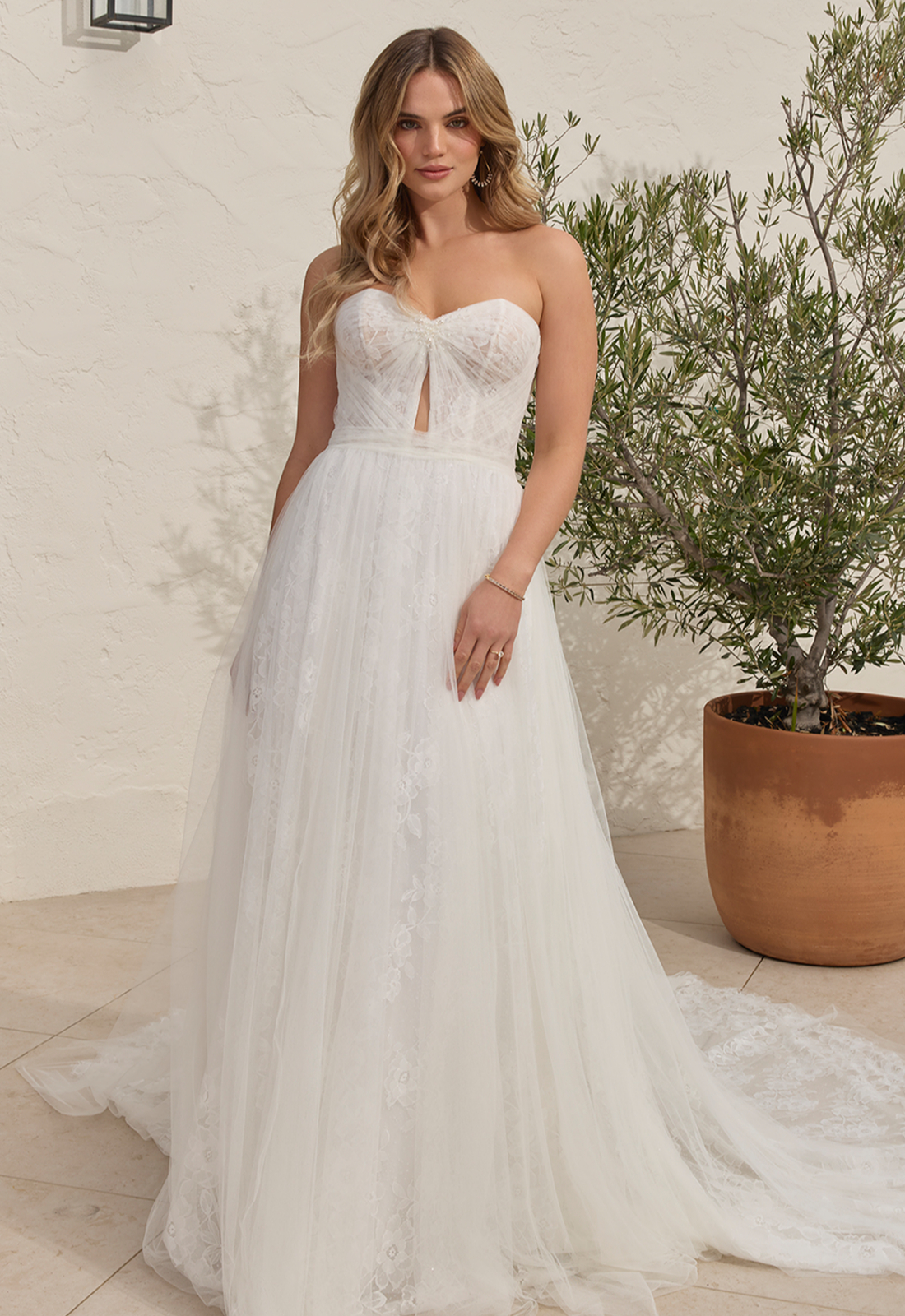 Sydney - Stella's Bridal Casablanca Sydney wedding dress featuring a soft a-line silhouette with sweetheart neckline, tulle and lace skirt, and keyhole details. Available at Stella’s Bridal in Westminster, Maryland.