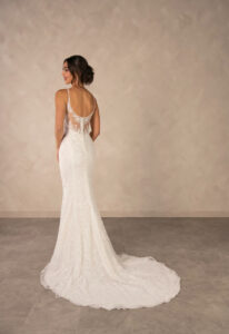 Tess - Stella's Bridal Essense of Australia D4567 wedding dress featuring a fitted silhouette with square neckline, beaded lace skirt, and sparkling details. Available at Stella’s Bridal in Westminster, Maryland.