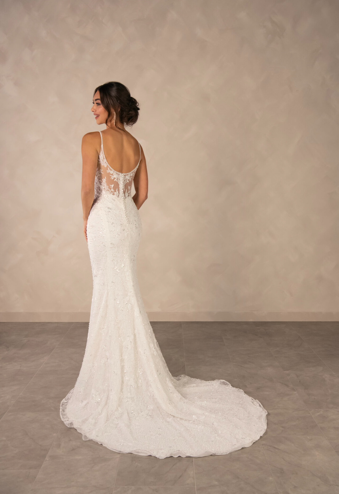 Tess Essense of Australia D4567 wedding dress featuring a fitted silhouette with square neckline, beaded lace skirt, and sparkling details. Available at Stella’s Bridal in Westminster, Maryland.