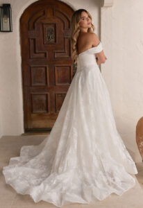 Vina - Stella's Bridal Beloved by Casablanca Vina wedding dress featuring a soft a-line silhouette with sweetheart neckline, lace skirt, and ruched details. Available at Stella’s Bridal in Westminster, Maryland.