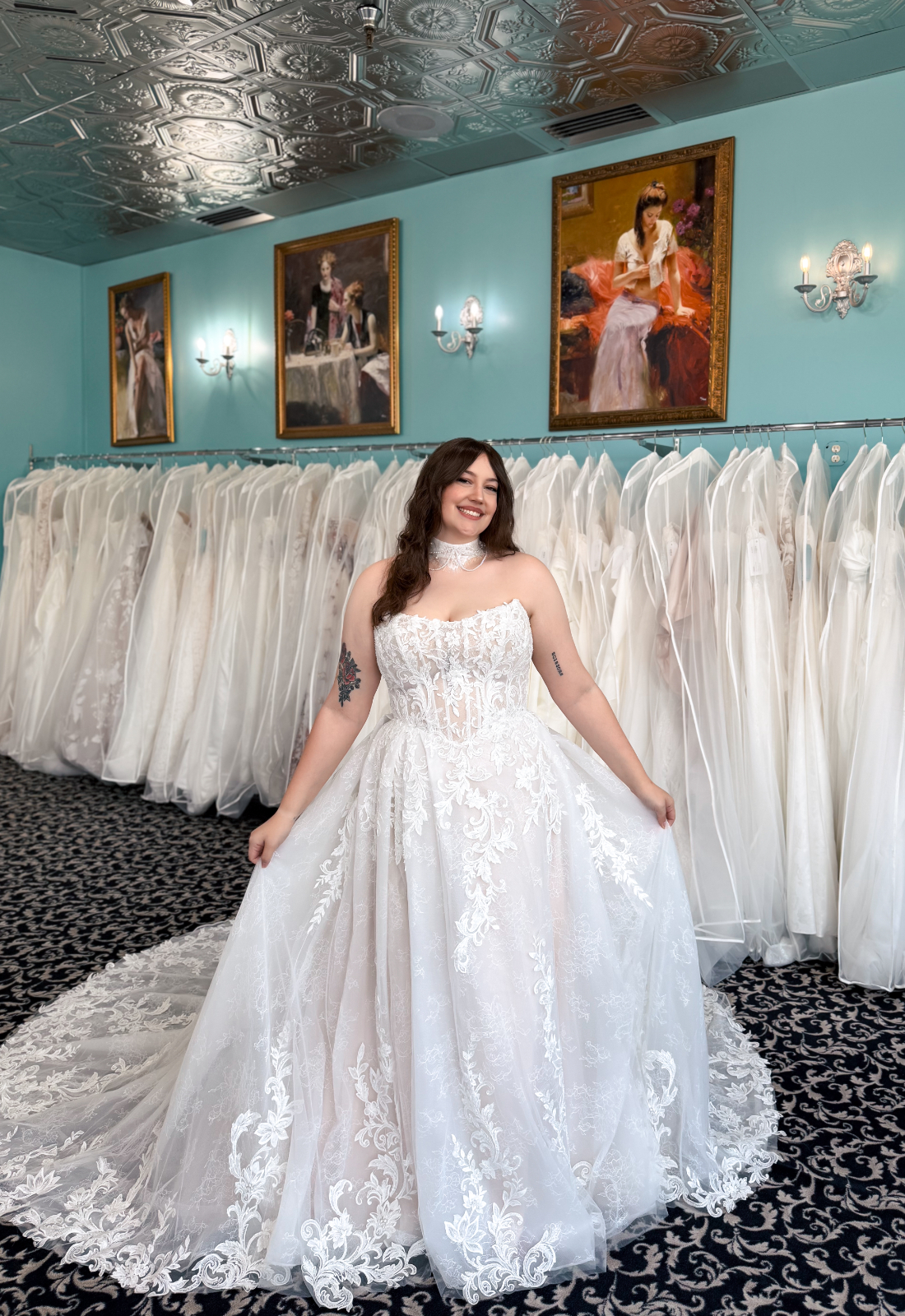 Lulu - Stella's Bridal Love it at Stella's Exclusive Lulu wedding dress featuring an a-line silhouette with cat eye neckline, scroll lace skirt, and sparkling details. Available at Stella’s Bridal in Westminster, Maryland.