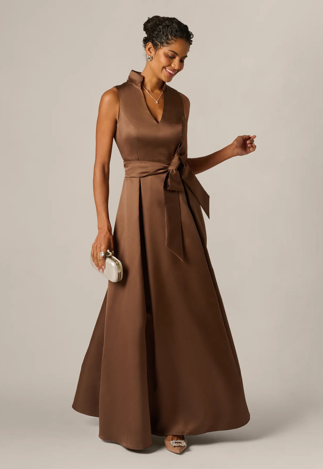 Mother of the bride and groom dress available at Stella’s Bridal in Maryland, featuring an elegant silhouette, flattering fit, and timeless design for a sophisticated wedding day look.