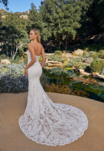 Casablanca Bridal Zelda wedding dress featuring a mermaid silhouette with sweetheart neckline, boho lace skirt, and beaded details. Available at Stella’s Bridal in Westminster, Maryland.