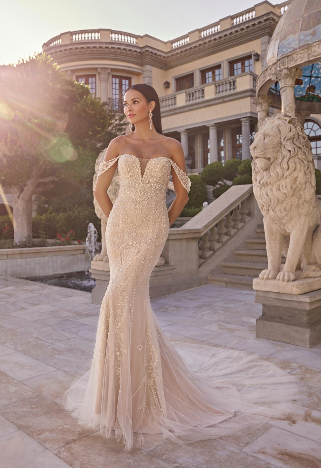 Dorthy - Stella's Bridal Casablanca Bridal Dorthy wedding dress featuring a mermaid silhouette with sweetheart neckline, boho lace skirt, and beaded details. Available at Stella’s Bridal in Westminster, Maryland.