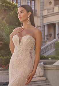 Casablanca Bridal Zelda wedding dress featuring a mermaid silhouette with sweetheart neckline, boho lace skirt, and beaded details. Available at Stella’s Bridal in Westminster, Maryland.