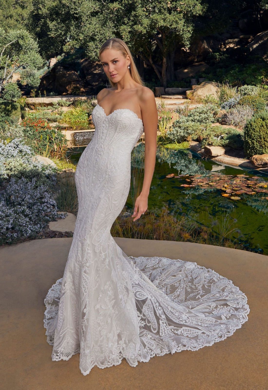 Zelda - Stella's Bridal Casablanca Bridal Zelda wedding dress featuring a mermaid silhouette with sweetheart neckline, boho lace skirt, and beaded details. Available at Stella’s Bridal in Westminster, Maryland.