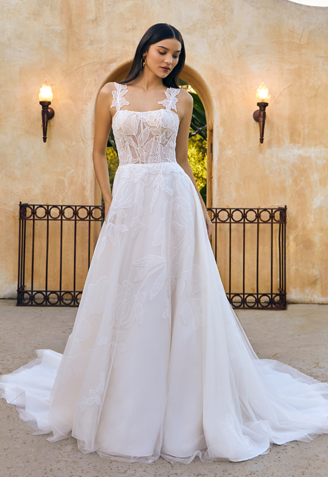 Cordelia - Stella's Bridal Casablanca Bridal Cordelia BL445 wedding dress featuring an a-line silhouette with cut-out sweetheart neckline, detachable sleeves, and illustrative lace details. Available at Stella’s Bridal in Westminster, Maryland.