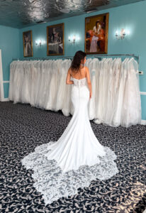 Heiress - Stella's Bridal A wedding gown from Stella's Private Collection featuring exclusive bridal design elements such as intricate lace, elegant draping, luxurious fabrics, and timeless silhouettes. Each gown is uniquely curated and available exclusively at Love it at Stella's Bridal.