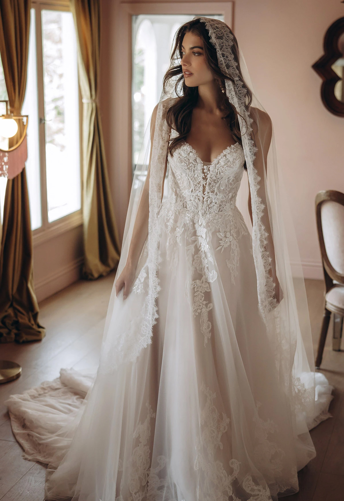 Hindley - Stella's Bridal Stella York SY8293 wedding dress featuring an a-line silhouette with plunge neckline, tulle skirt, and lace details. Available at Stella’s Bridal in Westminster, Maryland.