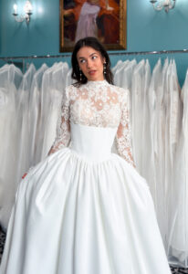 Jupiter - Stella's Bridal A wedding gown from Stella's Private Collection featuring exclusive bridal design elements such as intricate lace, elegant draping, luxurious fabrics, and timeless silhouettes. Each gown is uniquely curated and available exclusively at Love it at Stella's Bridal.