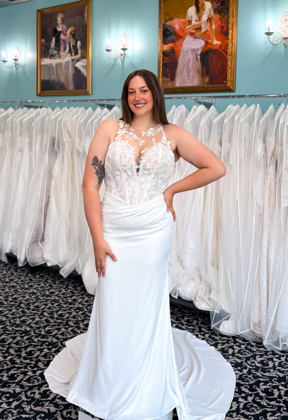 A wedding gown from Stella's Private Collection featuring exclusive bridal design elements such as intricate lace, elegant draping, luxurious fabrics, and timeless silhouettes. Each gown is uniquely curated and available exclusively at Love it at Stella's Bridal.