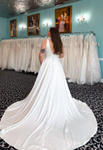 Kismet - Stella's Bridal A wedding gown from Stella's Private Collection featuring exclusive bridal design elements such as intricate lace, elegant draping, luxurious fabrics, and timeless silhouettes. Each gown is uniquely curated and available exclusively at Love it at Stella's Bridal.