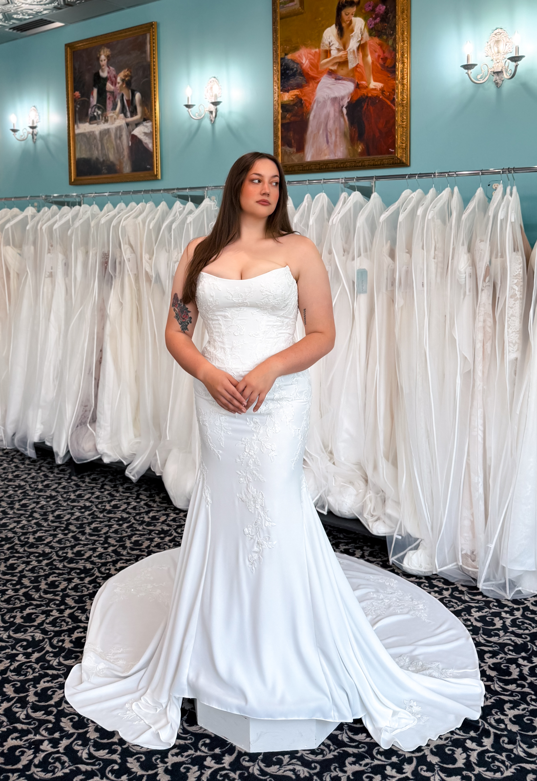 Raia - Stella's Bridal A wedding gown from Stella's Private Collection featuring exclusive bridal design elements such as intricate lace, elegant draping, luxurious fabrics, and timeless silhouettes. Each gown is uniquely curated and available exclusively at Love it at Stella's Bridal.