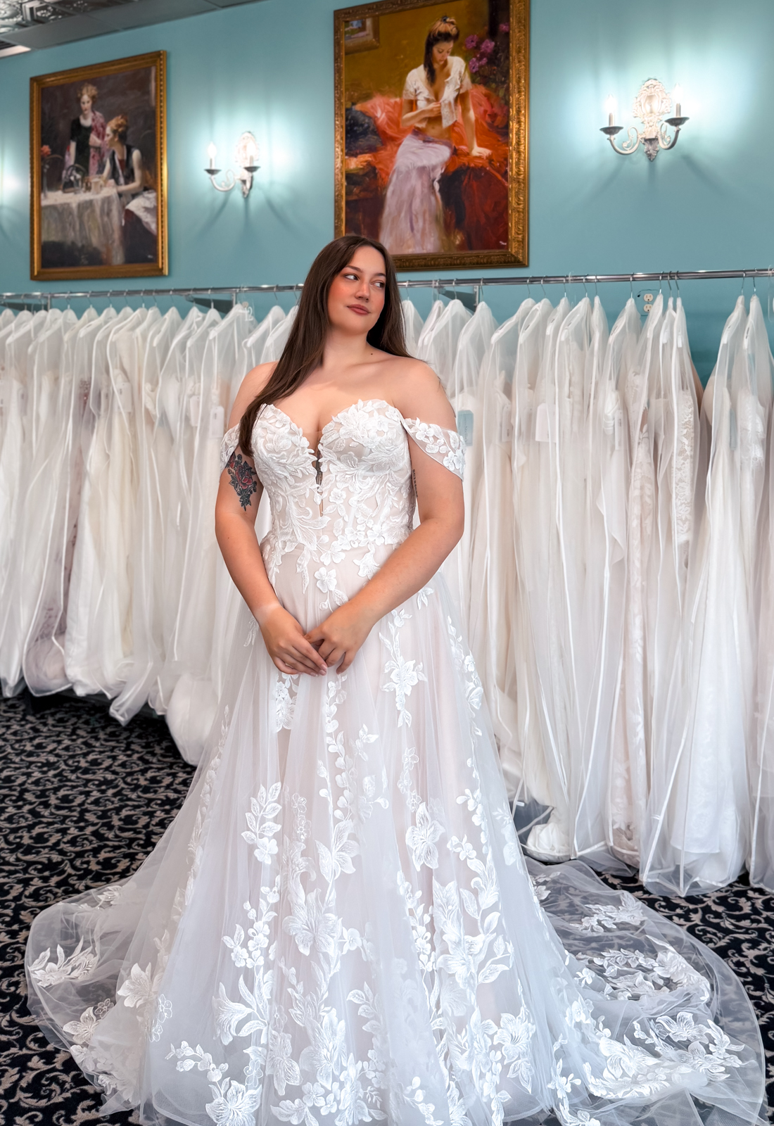 Robbie - Stella's Bridal A wedding gown from Stella's Private Collection featuring exclusive bridal design elements such as intricate lace, elegant draping, luxurious fabrics, and timeless silhouettes. Each gown is uniquely curated and available exclusively at Love it at Stella's Bridal.