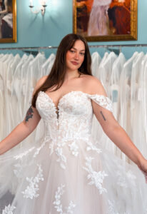 Robbie - Stella's Bridal A wedding gown from Stella's Private Collection featuring exclusive bridal design elements such as intricate lace, elegant draping, luxurious fabrics, and timeless silhouettes. Each gown is uniquely curated and available exclusively at Love it at Stella's Bridal.