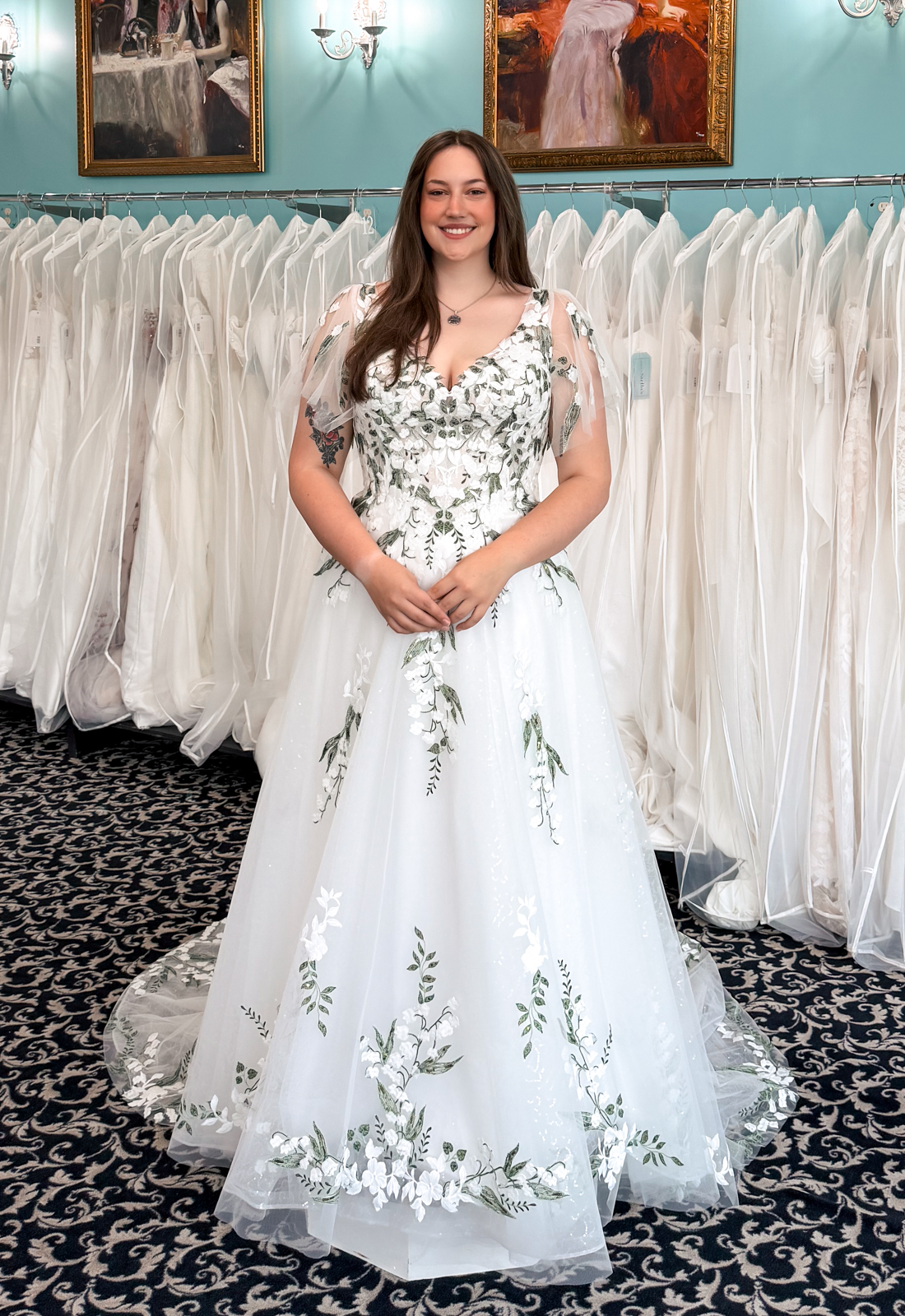 Vally Bloom - Stella's Bridal A wedding gown from Stella's Private Collection featuring exclusive bridal design elements such as intricate lace, elegant draping, luxurious fabrics, and timeless silhouettes. Each gown is uniquely curated and available exclusively at Love it at Stella's Bridal.