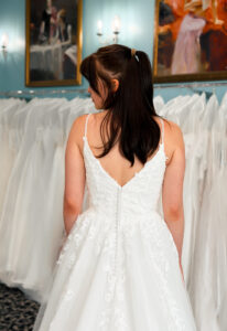 Ellarose - Stella's Bridal A wedding gown from Stella's Private Collection featuring exclusive bridal design elements such as intricate lace, elegant draping, luxurious fabrics, and timeless silhouettes. Each gown is uniquely curated and available exclusively at Love it at Stella's Bridal.