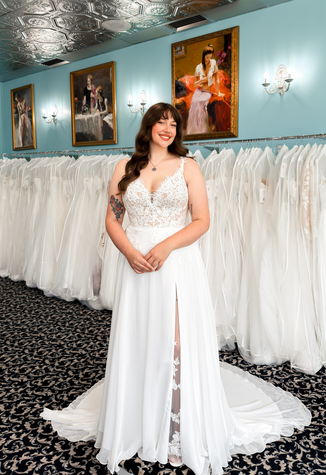 A wedding gown from Stella's Private Collection featuring exclusive bridal design elements such as intricate lace, elegant draping, luxurious fabrics, and timeless silhouettes. Each gown is uniquely curated and available exclusively at Love it at Stella's Bridal.